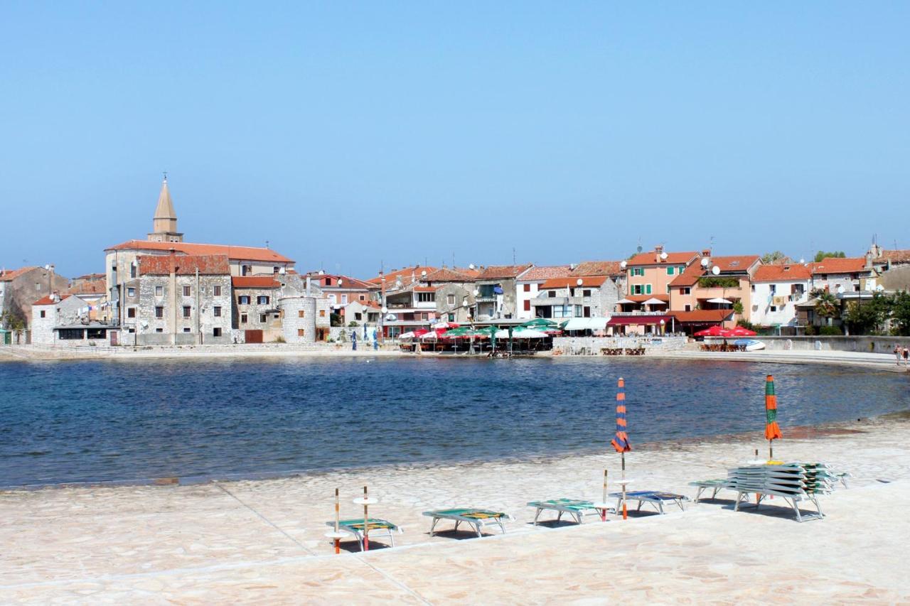 Apartments With A Parking Space Umag - 7066 المظهر الخارجي الصورة